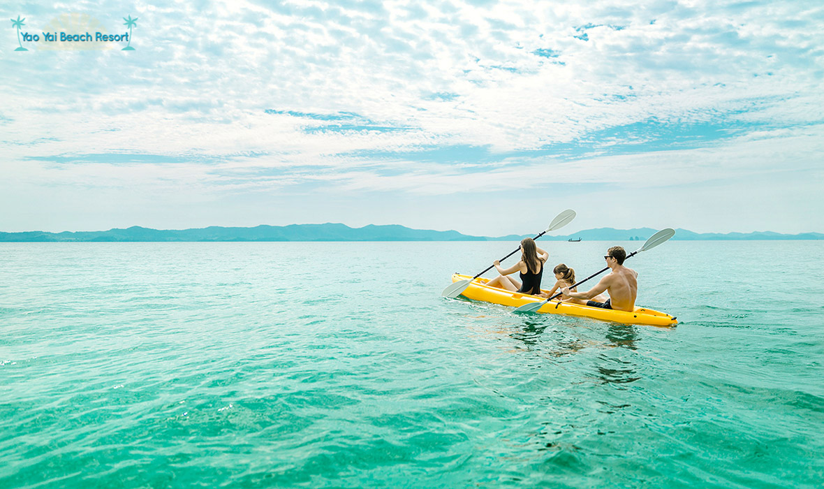 family kayaking Yao Yai Beach Resort Thailand